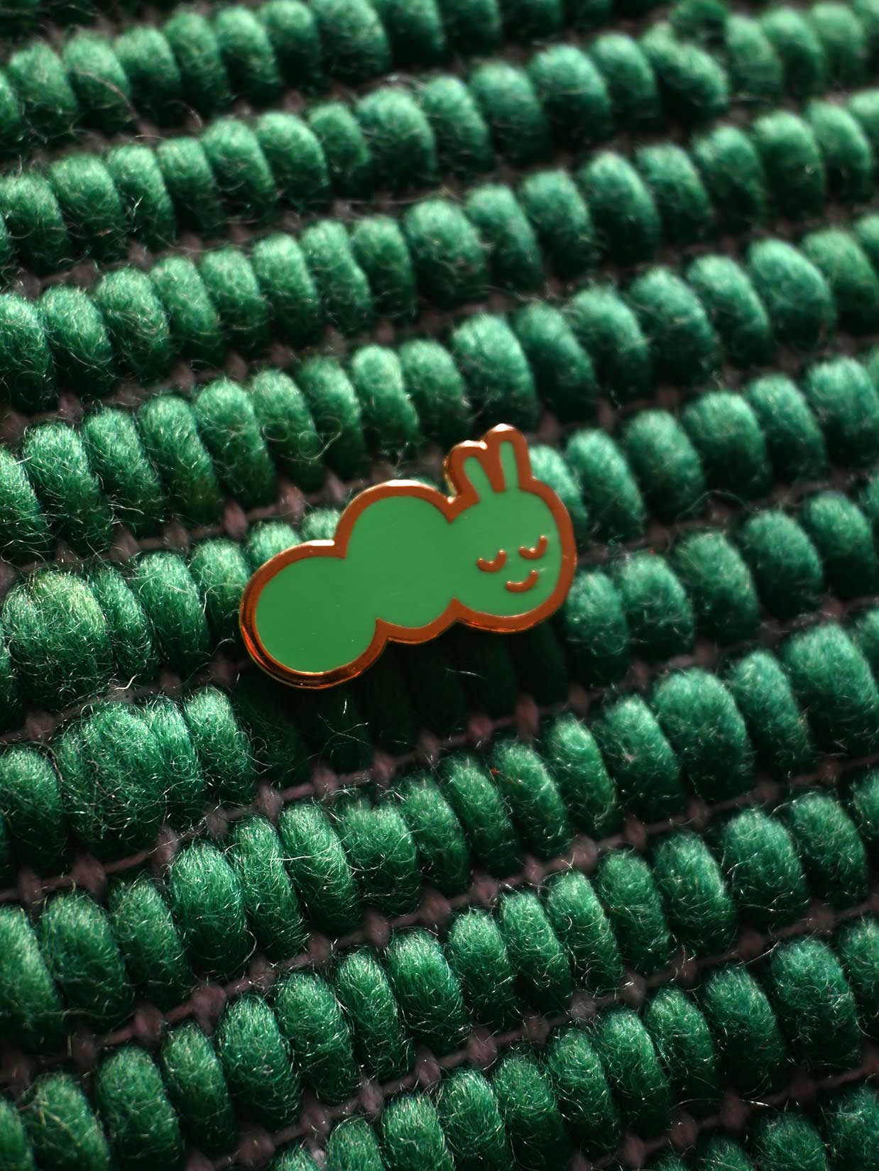 "Caterpillar" Enamel pin. Designed by HO HOS HOLE IN THE WALL (NYC)