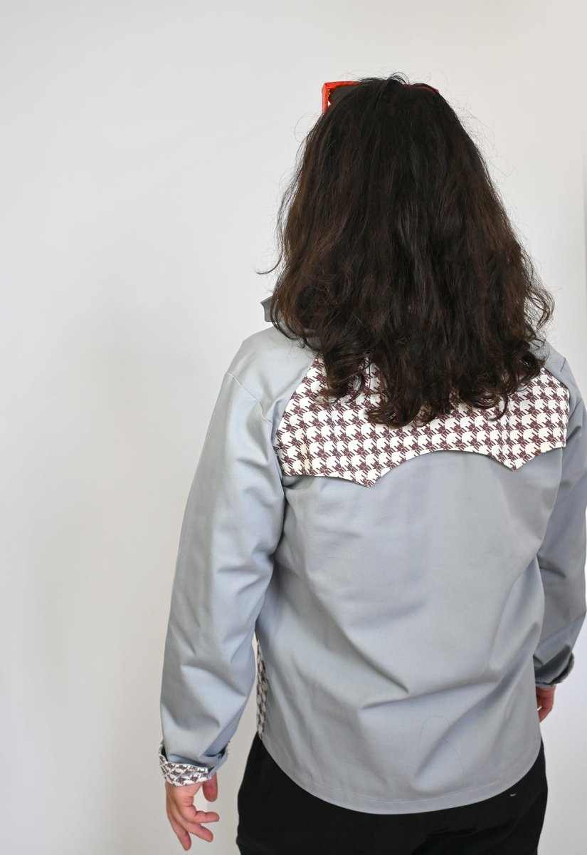 "Beetletooth" print Jacket design by Ho Hos Hole in The Wall clothing brand. Made with Eco-Twill, a combo organic cotton and polyester spun from recycled water and soda bottles.